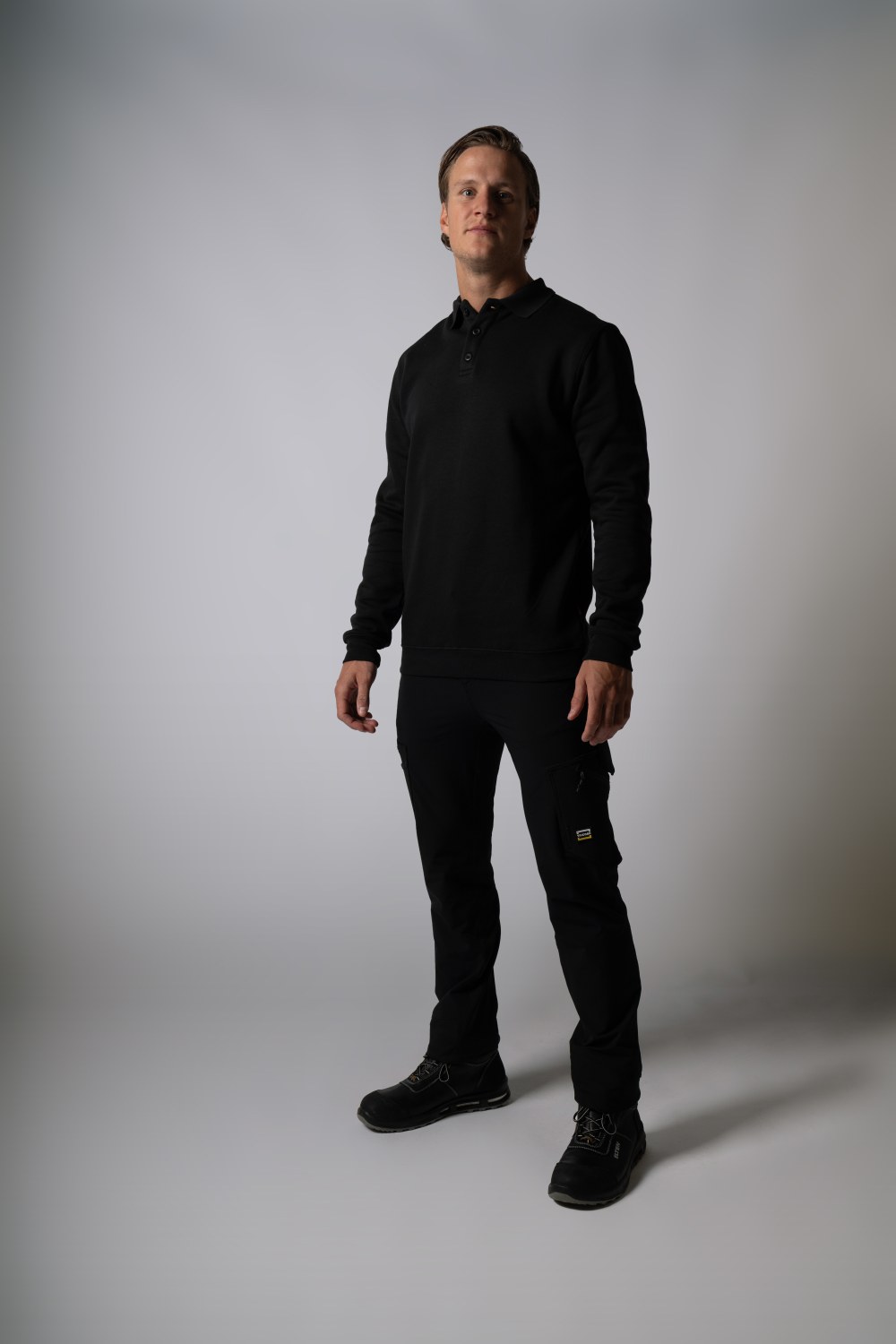 TRICORP Sweatshirt Polokragen und Bund in Black – Modellansicht