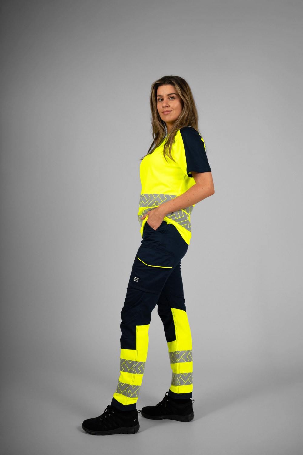 TRICORP Arbeitshose 2-Way Stretch High Vis Redefined Damen in Ink-Fluoryellow – Modellansicht