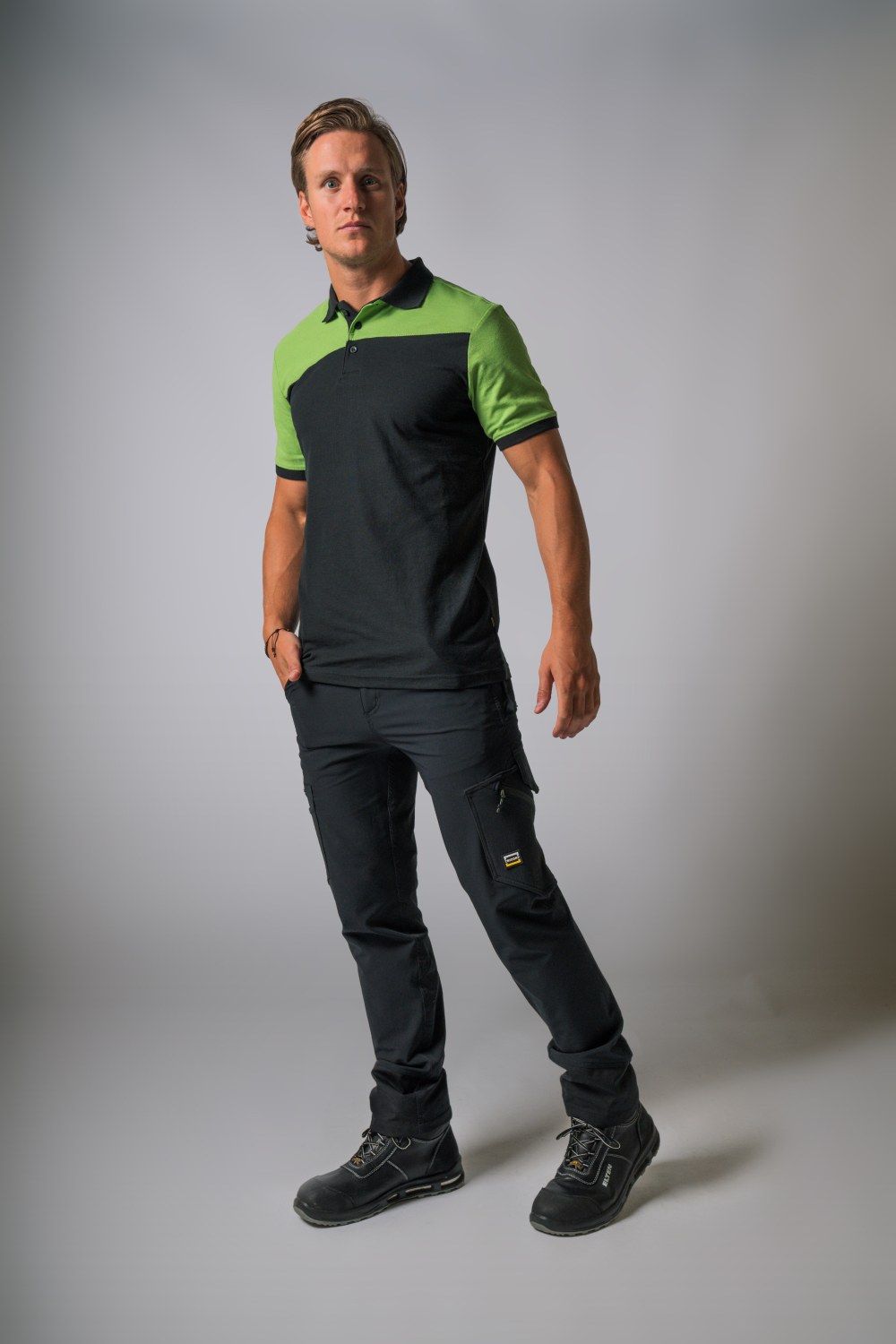 TRICORP Poloshirt Bicolor Quernaht in Black-Lime – Modellansicht