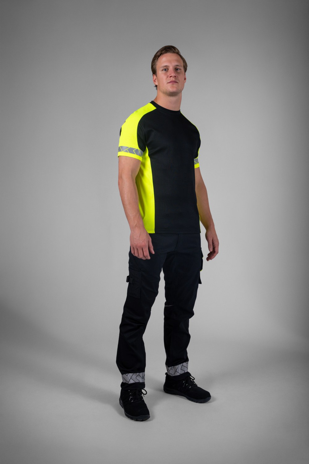 TRICORP Arbeitshose 2-Way Stretch Reflective Redefined in Black-Fluoryellow – Modellansicht